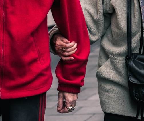 person wearing red jacket